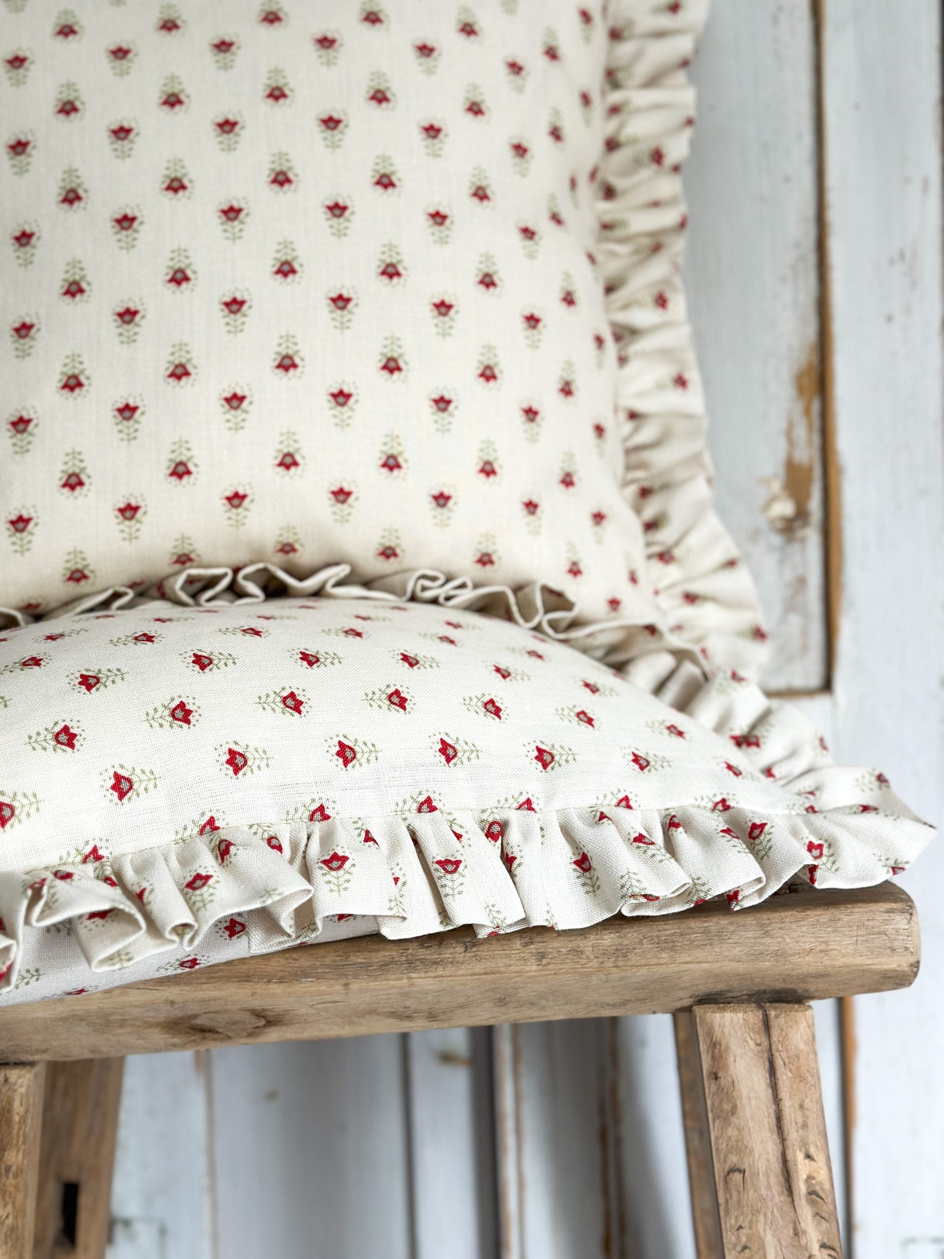 Small flower frilled cushion in red and green