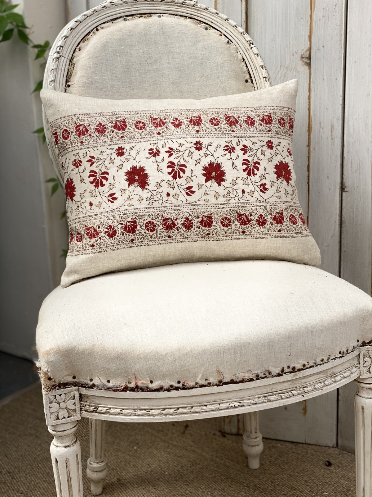 Freya red small oblong cushion
