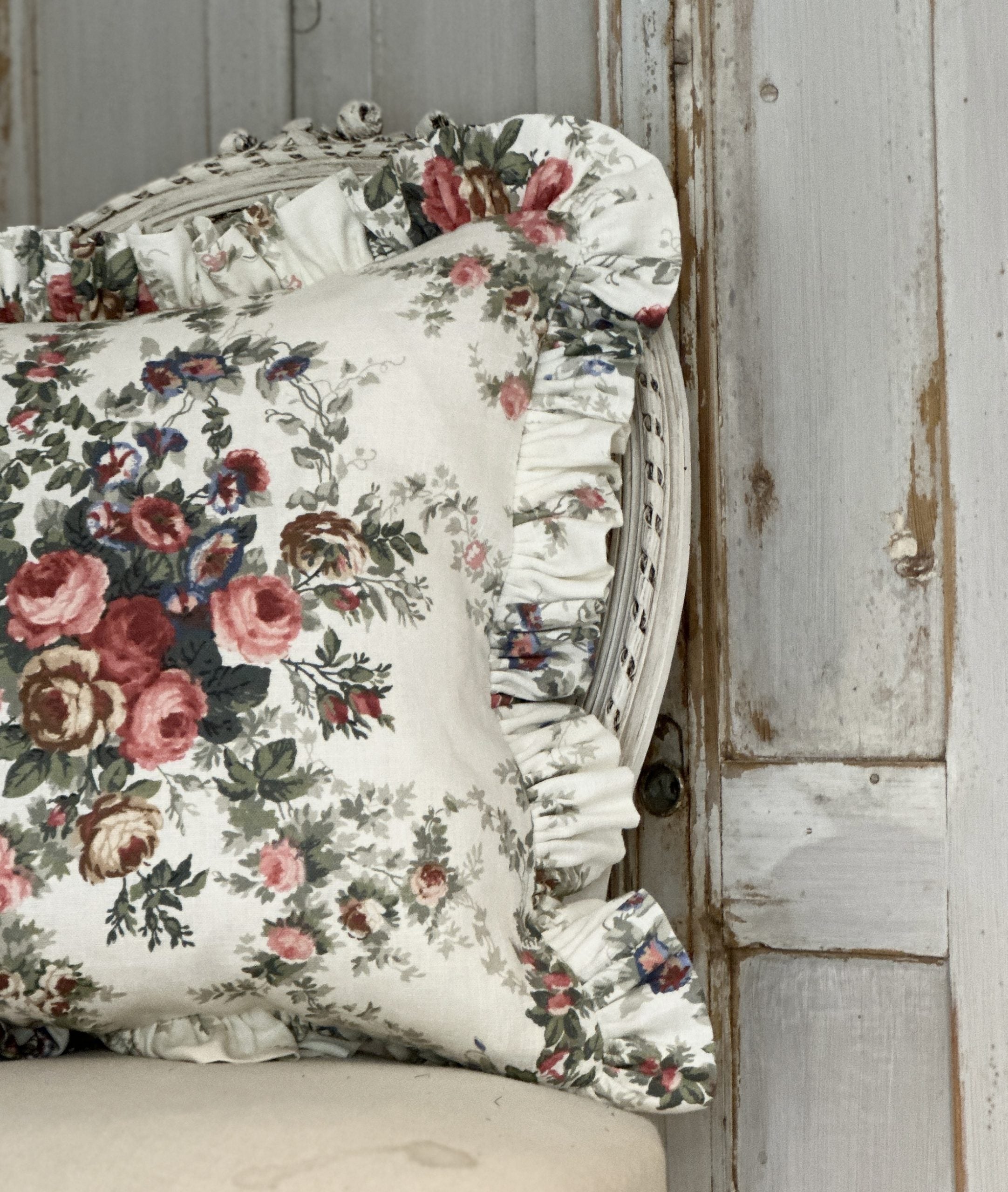 Christina rose frilled cushion.