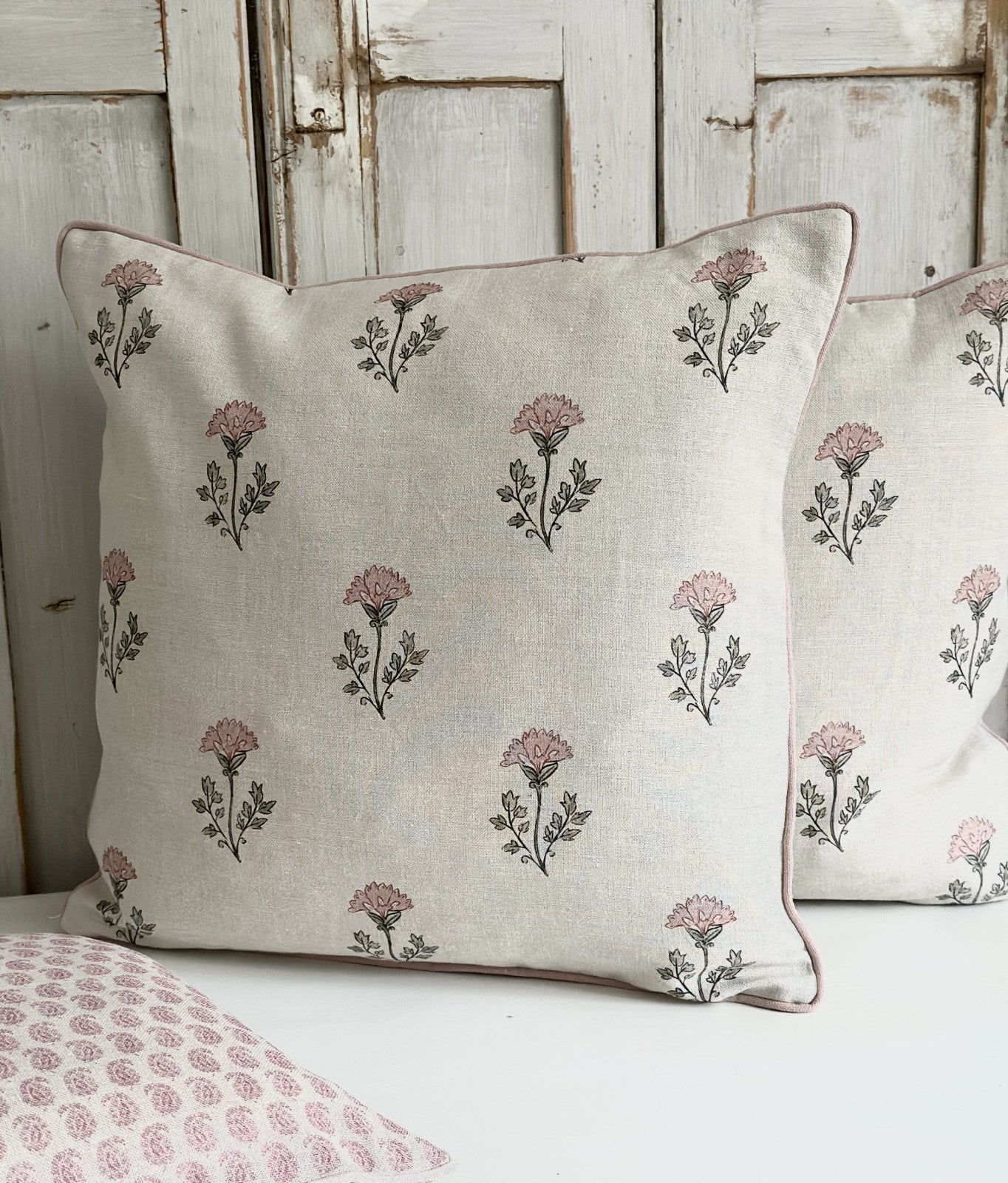 Thea pink on ivory linen cushion