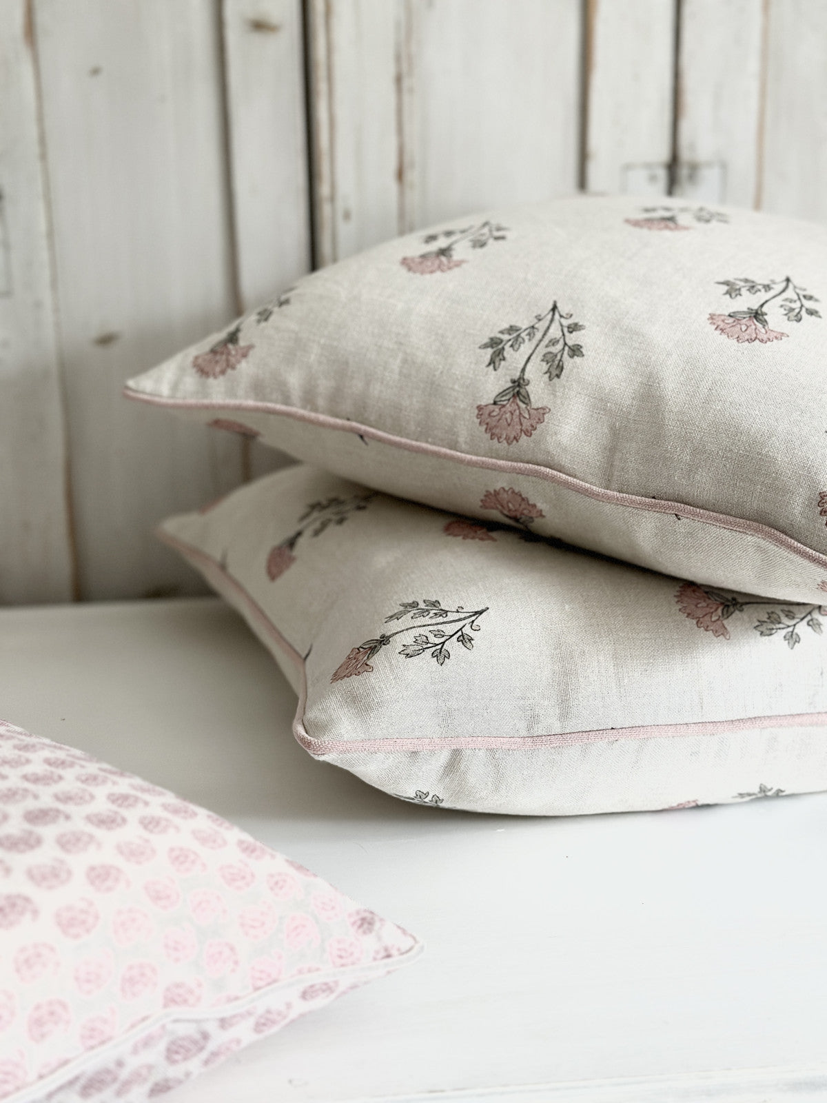 Thea pink on ivory linen cushion