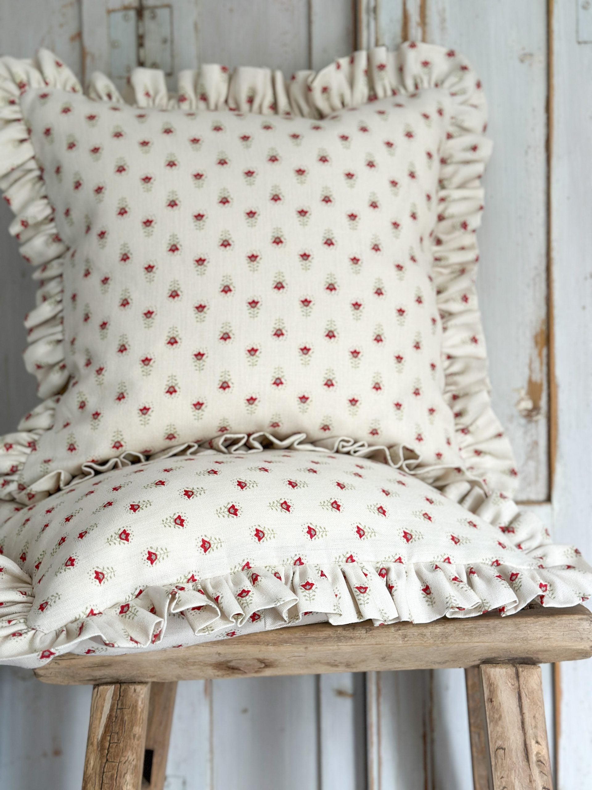 Small flower frilled cushion in red and green