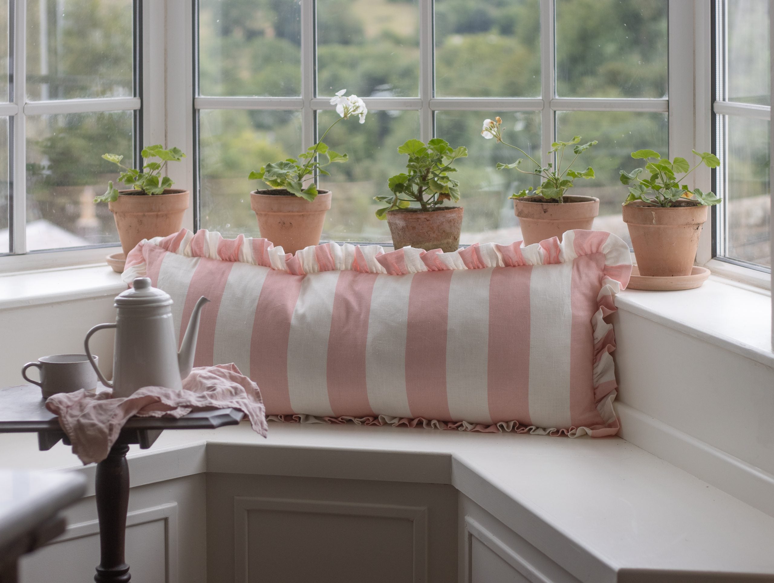 Wide stripe frilled lumber cushion