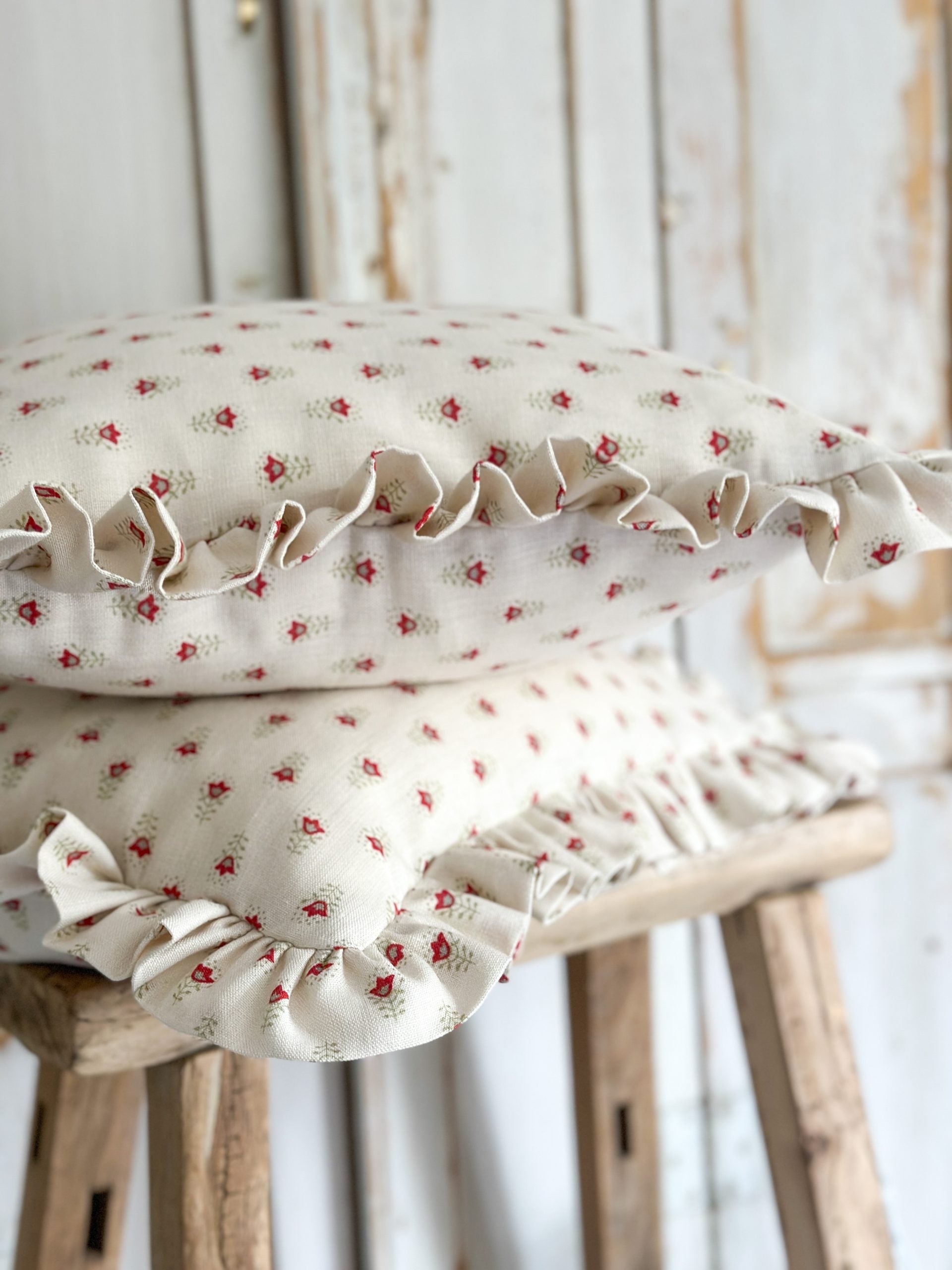 Small flower frilled cushion in red and green