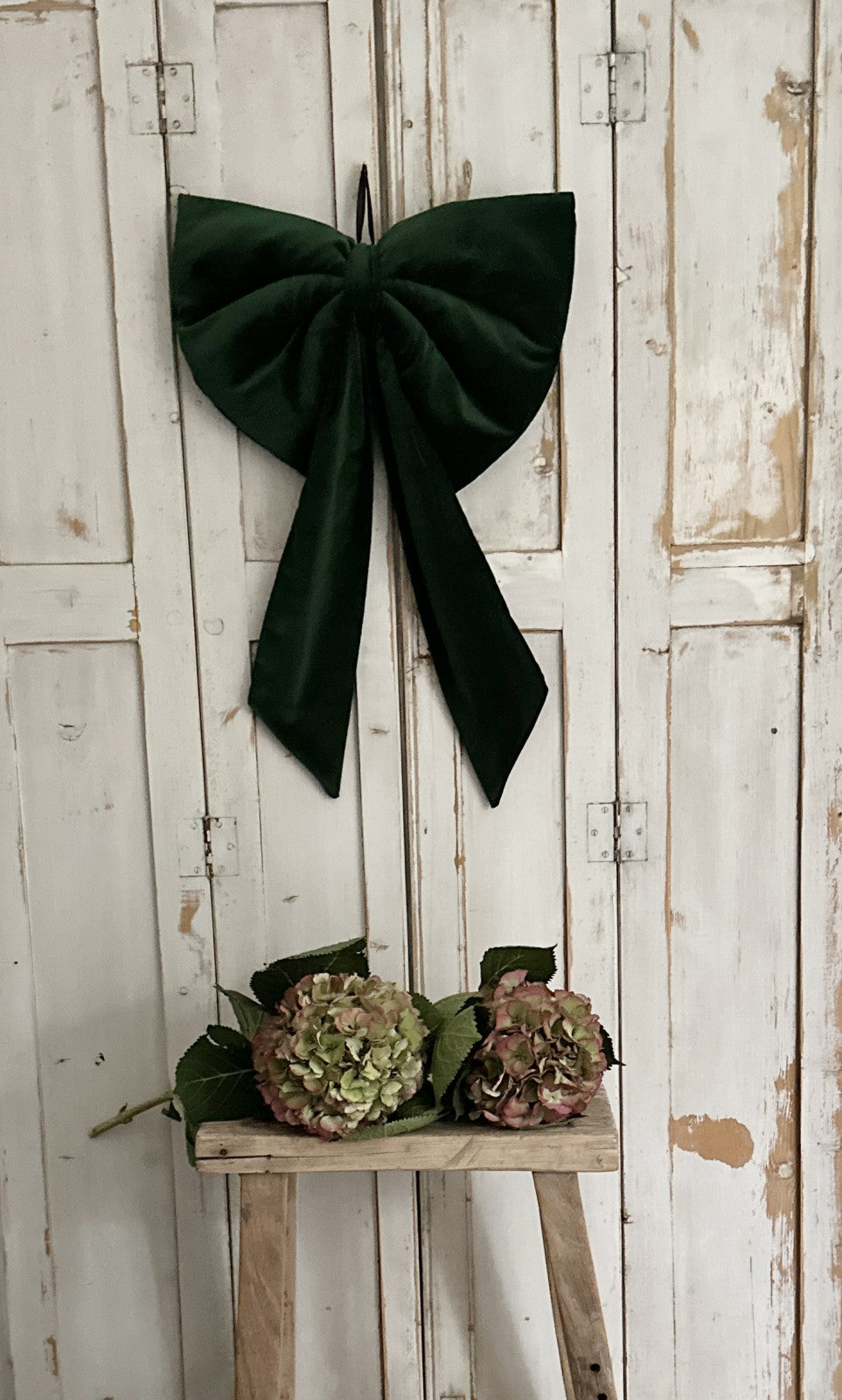 Large green velvet bow