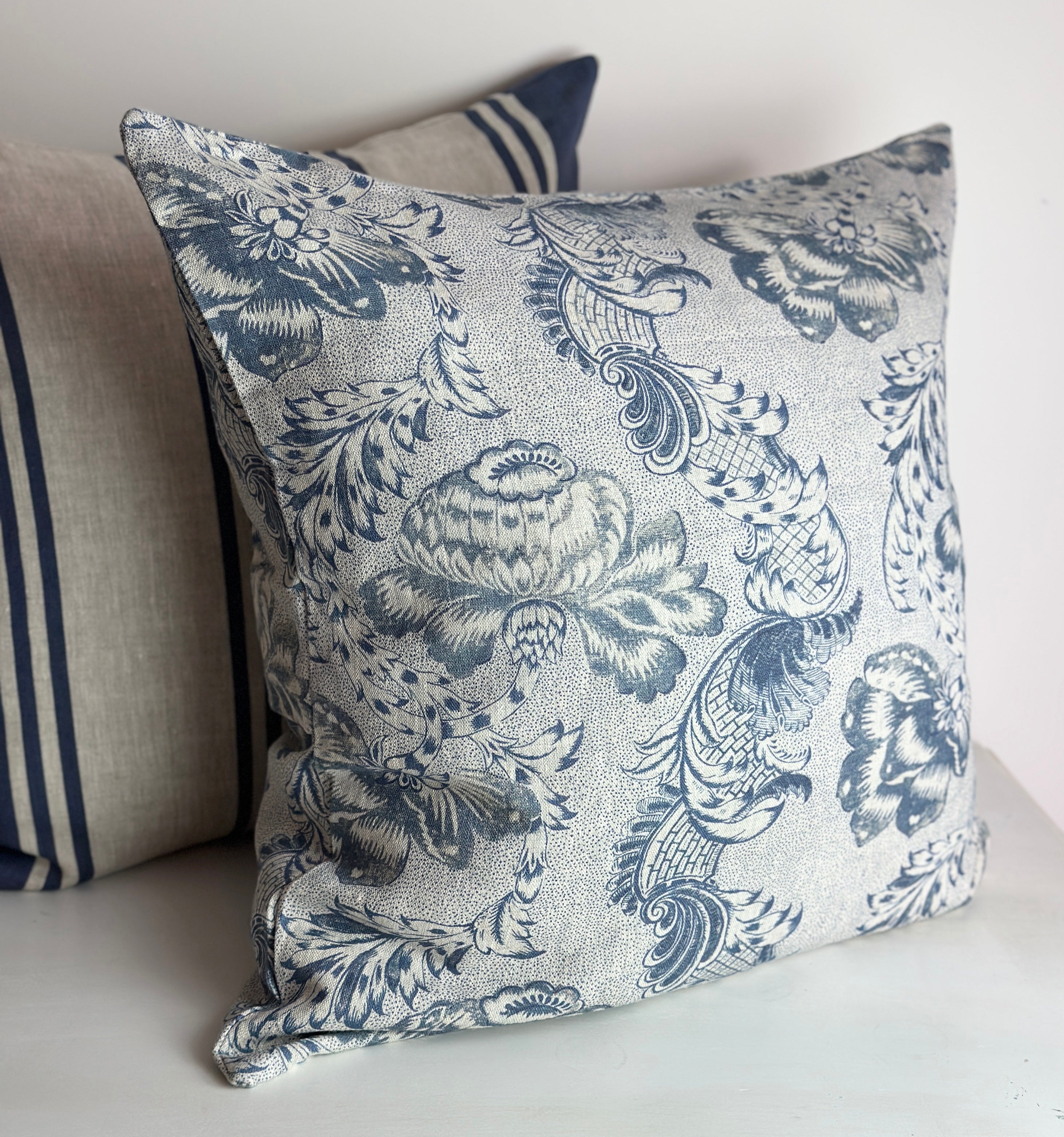 Betsy Navy on Natural Linen cushion