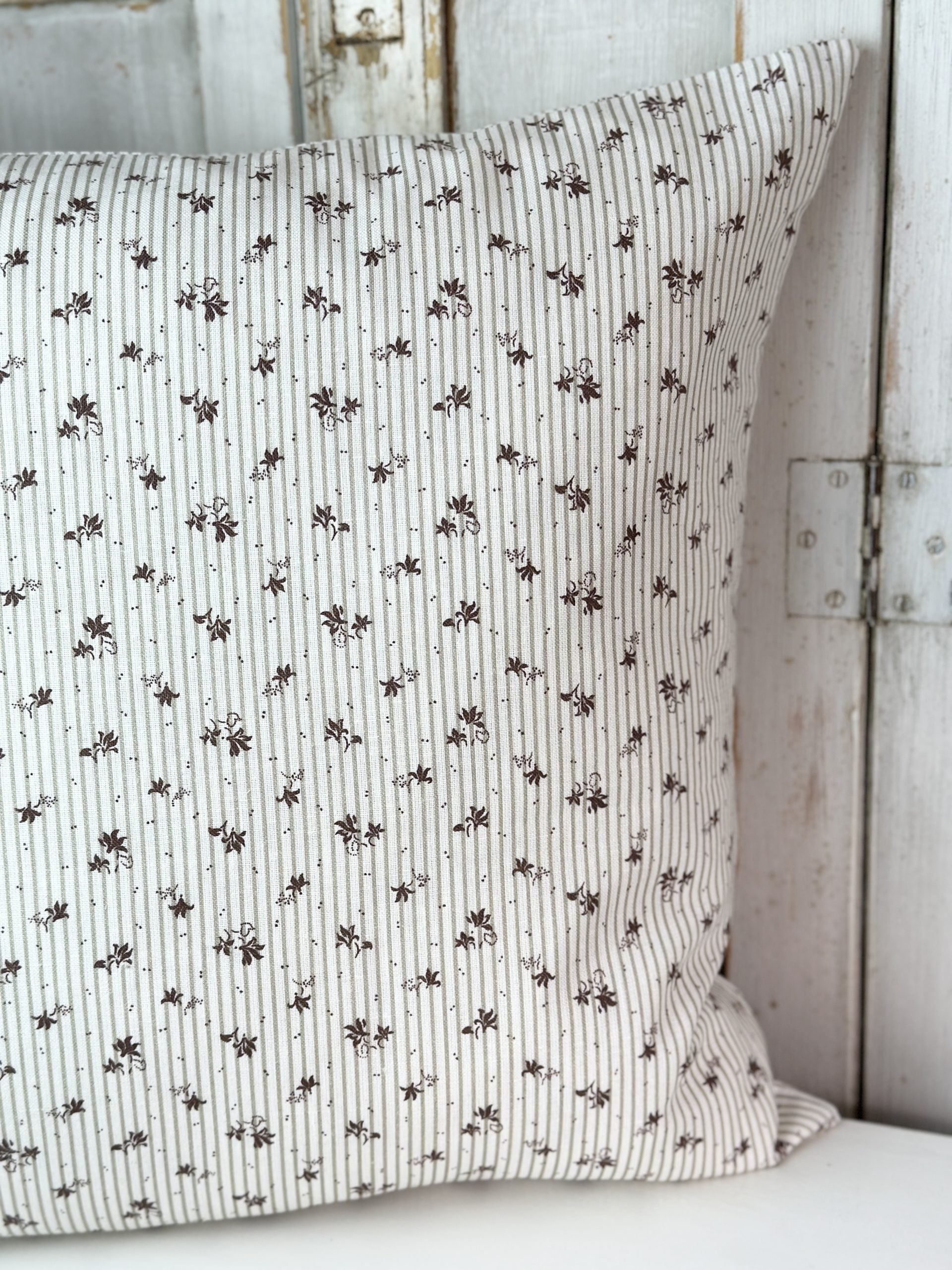 Metro black on white cushion